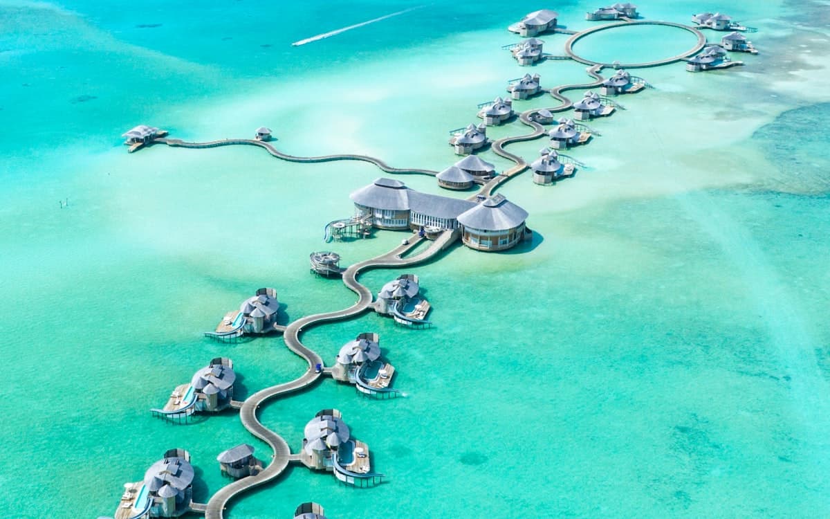 Aerial view of overwater bungalows in the Maldives